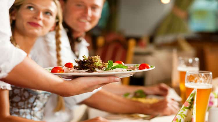 waiter serving a meal